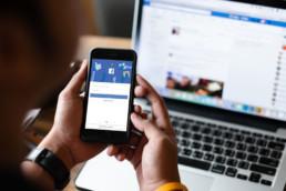 Facebook UI on mobile and laptop