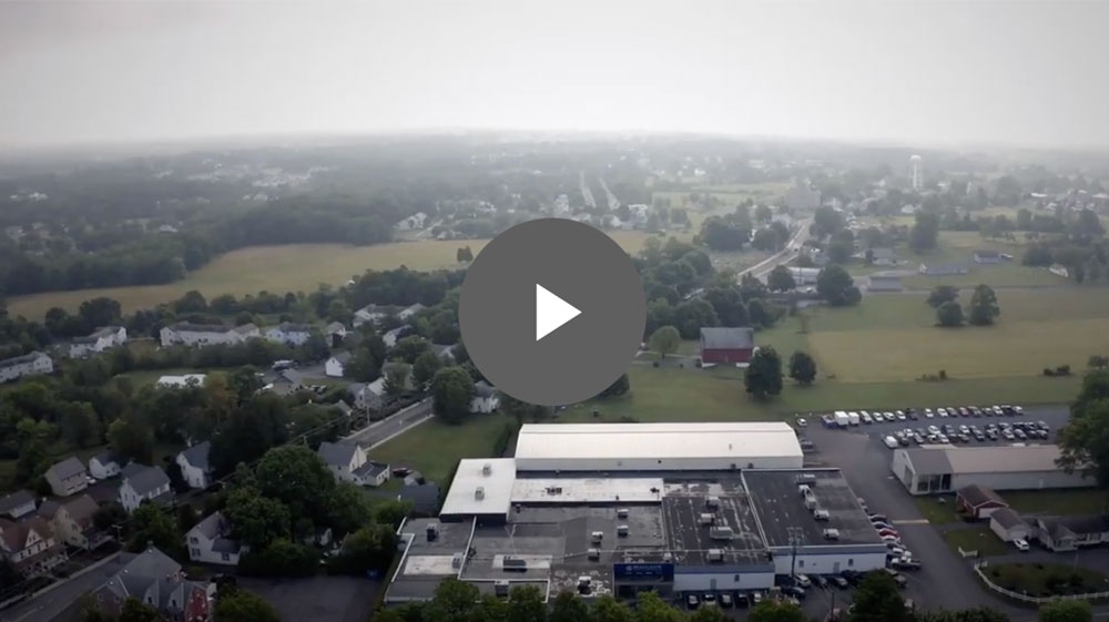 Drone Footage of Bracalente Pennsylvania Facility with Play Button