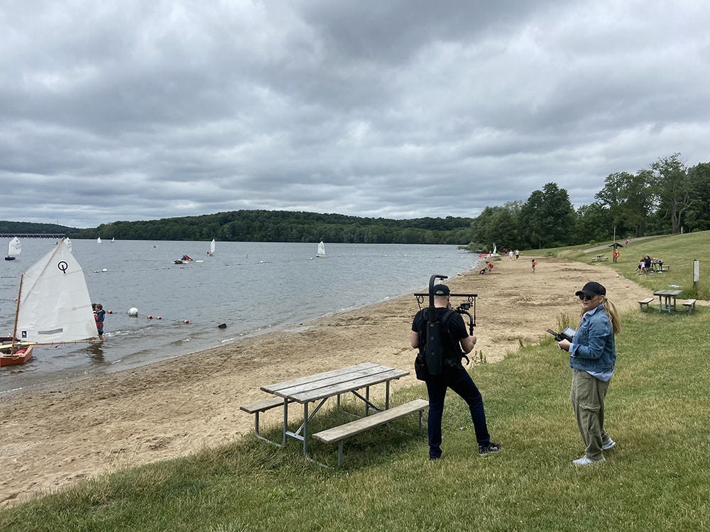 Filming The Ocean by the water