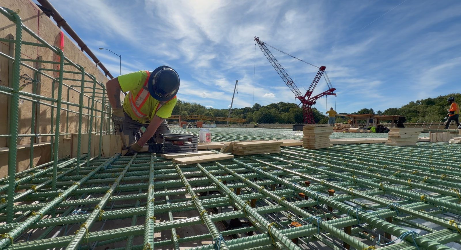 Construction worker scaling building